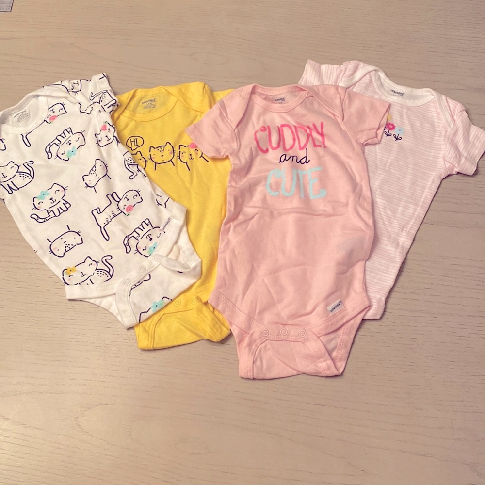 NWOT set of 4 onesies